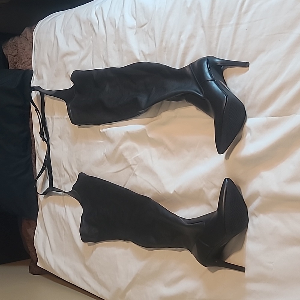 Azelea Wang Thigh high black boots with belt